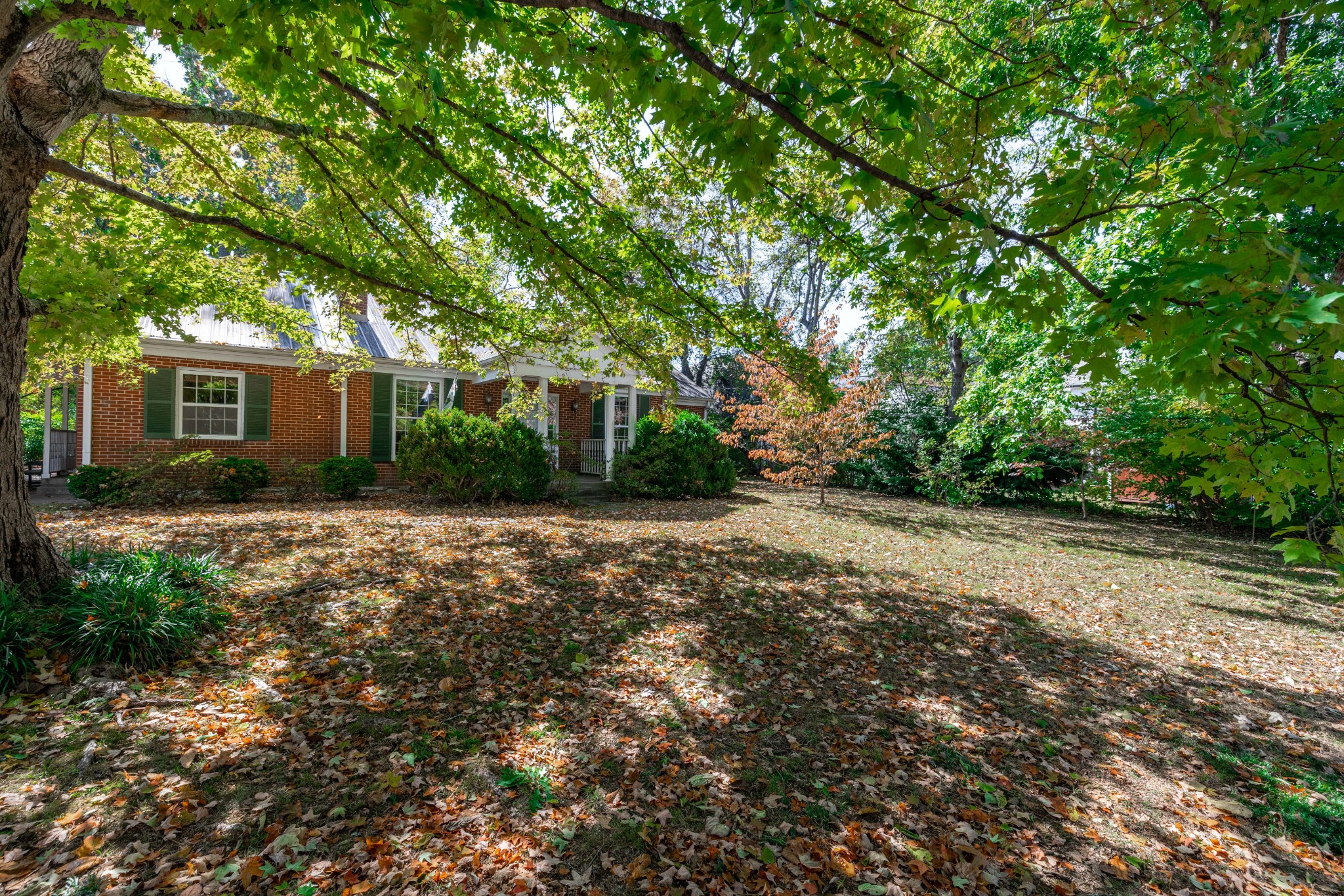 714 Murfreesboro Road Franklin, TN 37064 - Photo 33 of 46 a front view of house with yard and green space