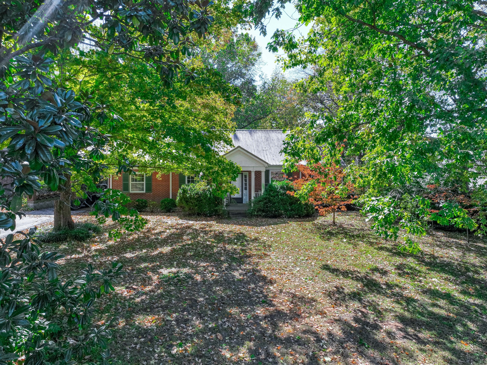 714 Murfreesboro Road Franklin, TN 37064 - Photo 36 of 46 a front view of a house with a yard