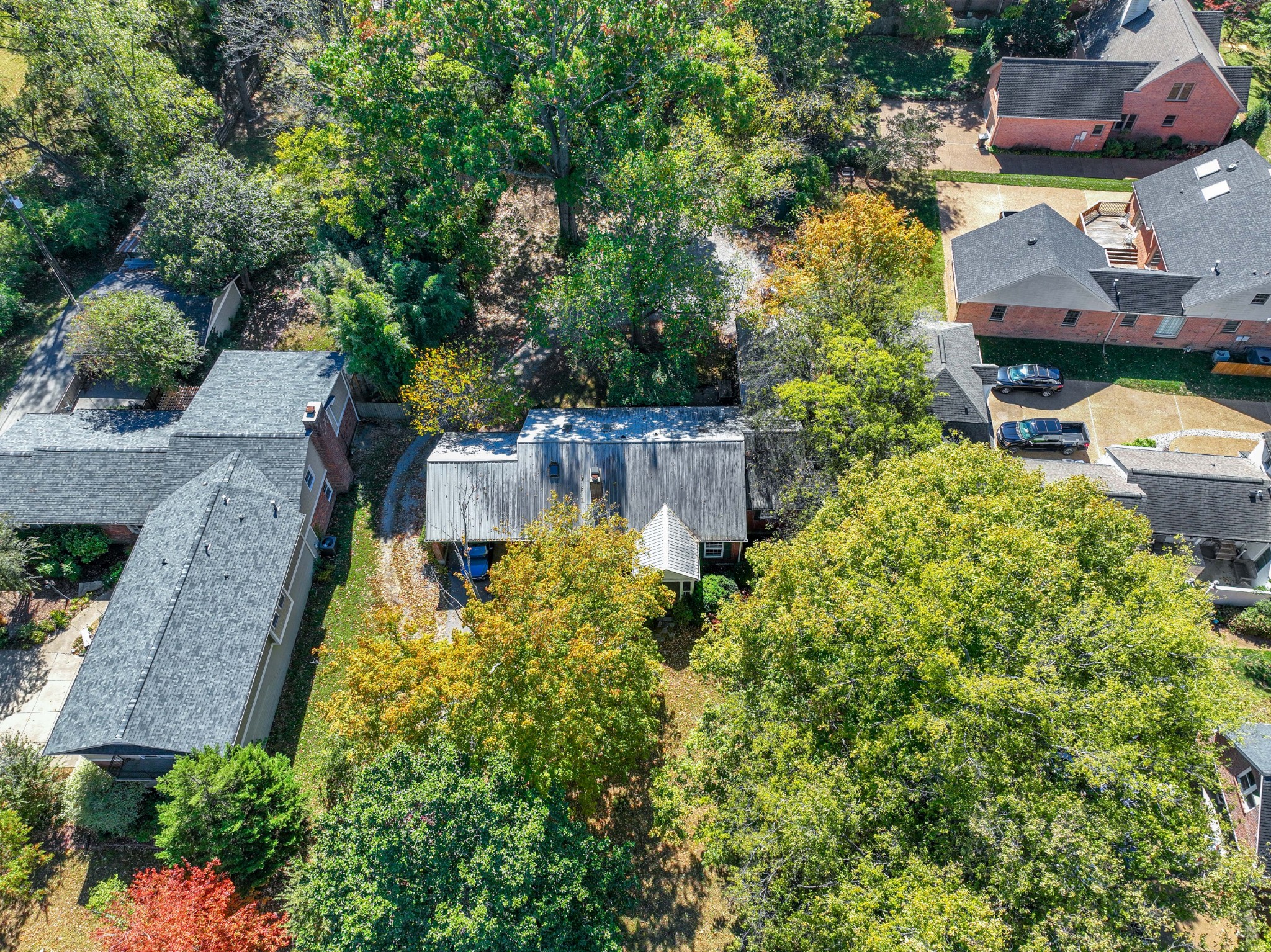 714 Murfreesboro Road Franklin, TN 37064 - Photo 38 of 46 an aerial view of a house with a garden and swimming pool