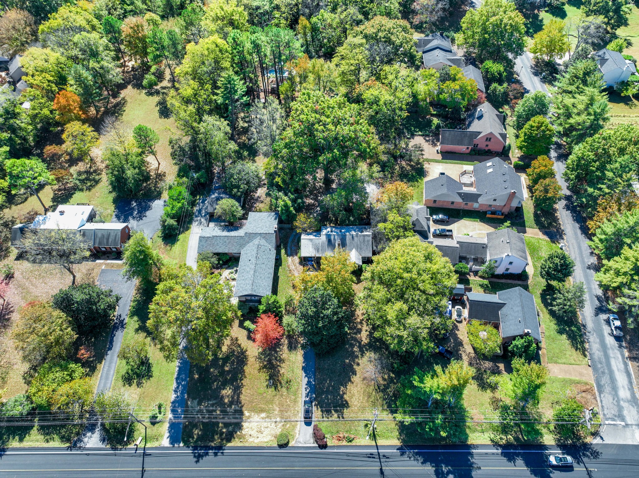 714 Murfreesboro Road Franklin, TN 37064 - Photo 40 of 46 an aerial view of a house with a yard and large trees