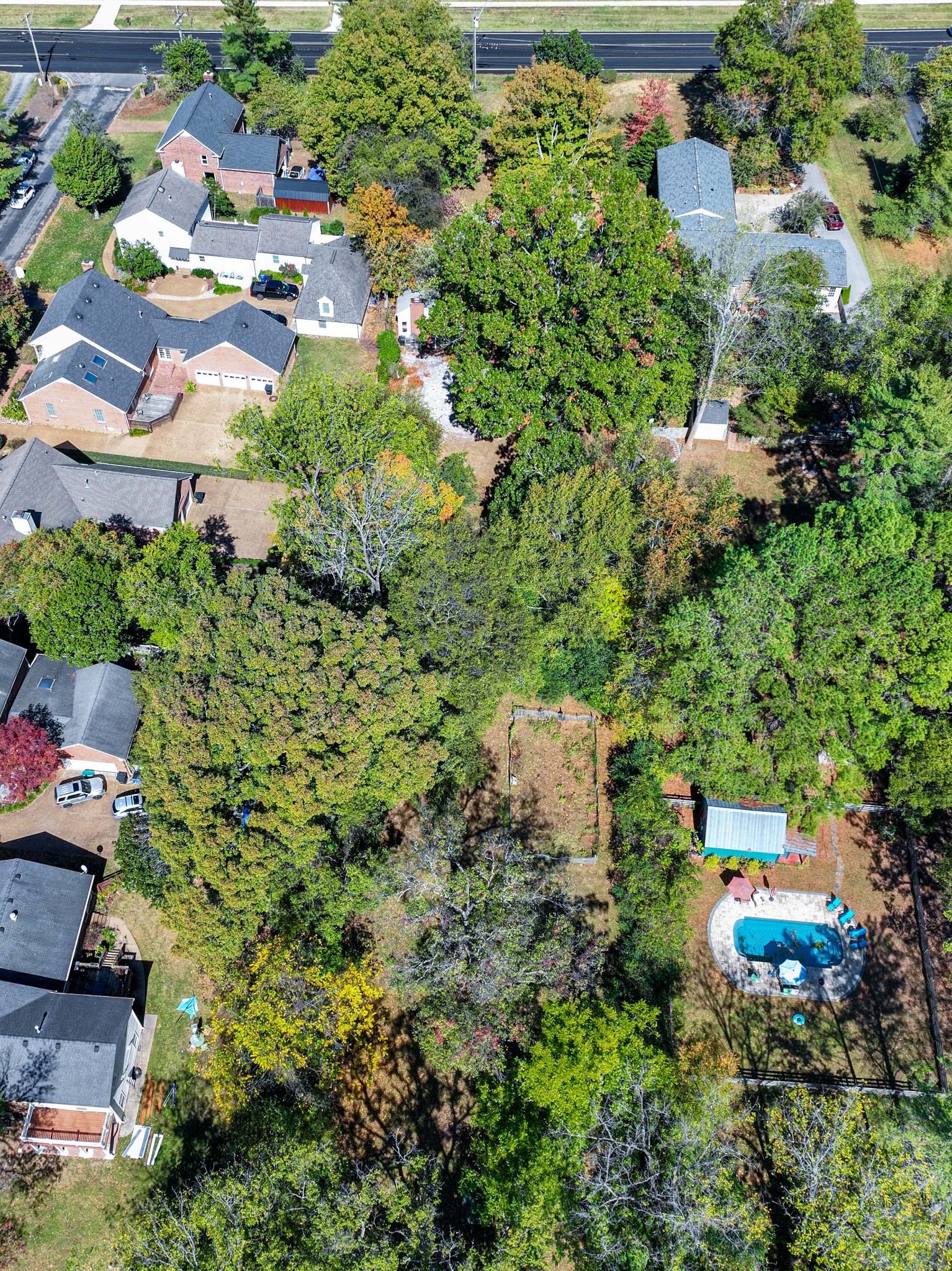 714 Murfreesboro Road Franklin, TN 37064 - Photo 42 of 46 an aerial view of residential house with outdoor space and trees all around