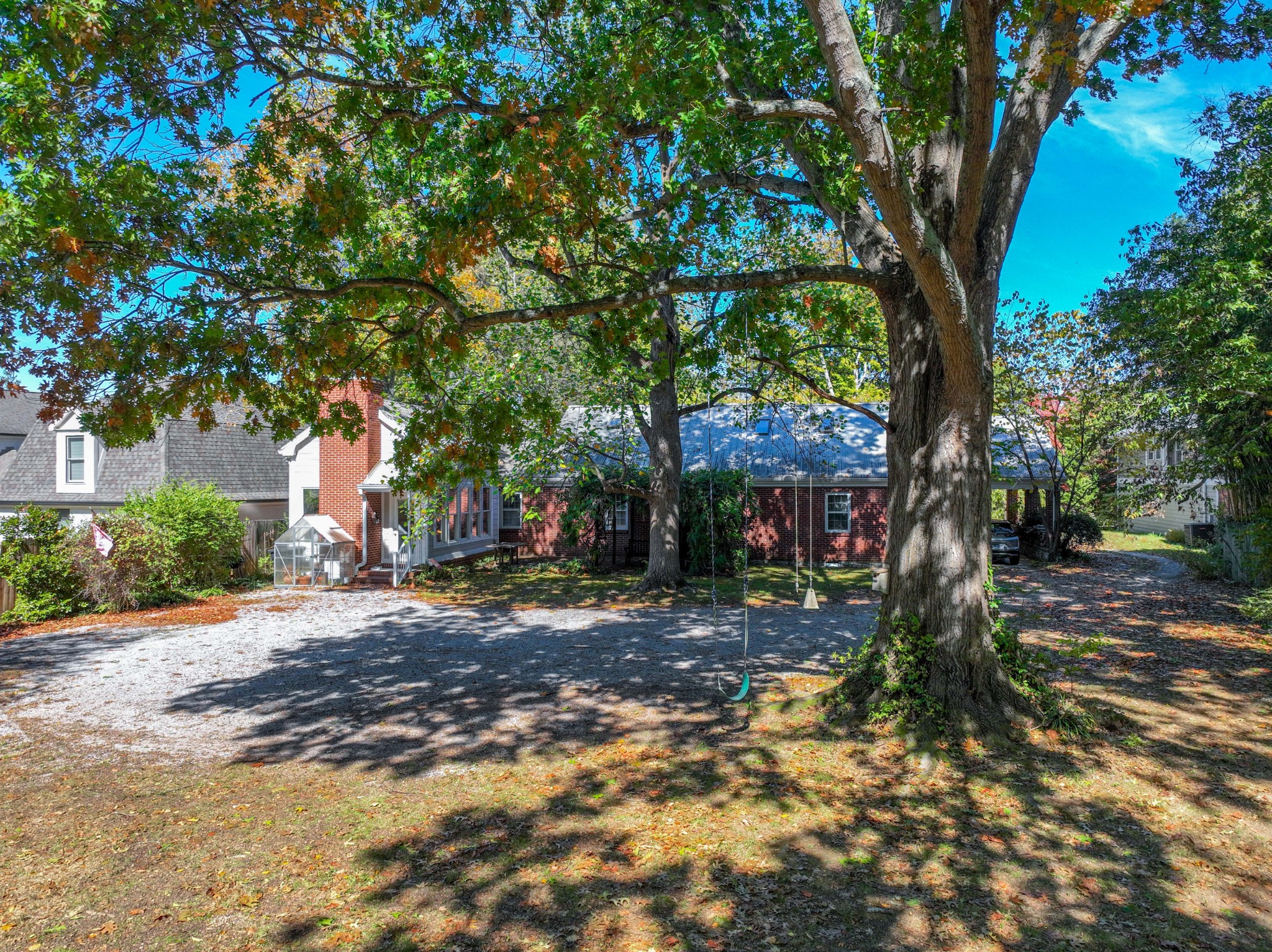 714 Murfreesboro Road Franklin, TN 37064 - Photo 46 of 46 a backyard of a house with lots of green space
