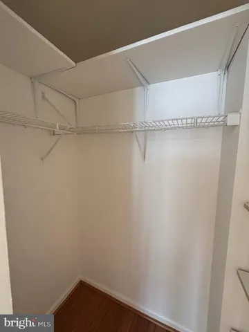 a view of a kitchen with a sink and dishwasher stove top oven