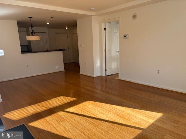 1312 Massachusetts Avenue Northwest, Unit 708 Washington, DC 20005 - Photo 26 of 34 a view of a room with wooden floor and cabinet
