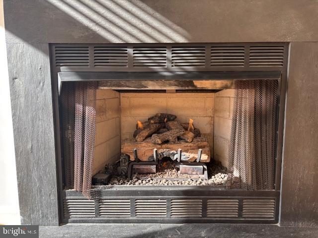 1312 Massachusetts Avenue Northwest, Unit 708 Washington, DC 20005 - Photo 10 of 34 a view of a door of the house and wooden floor