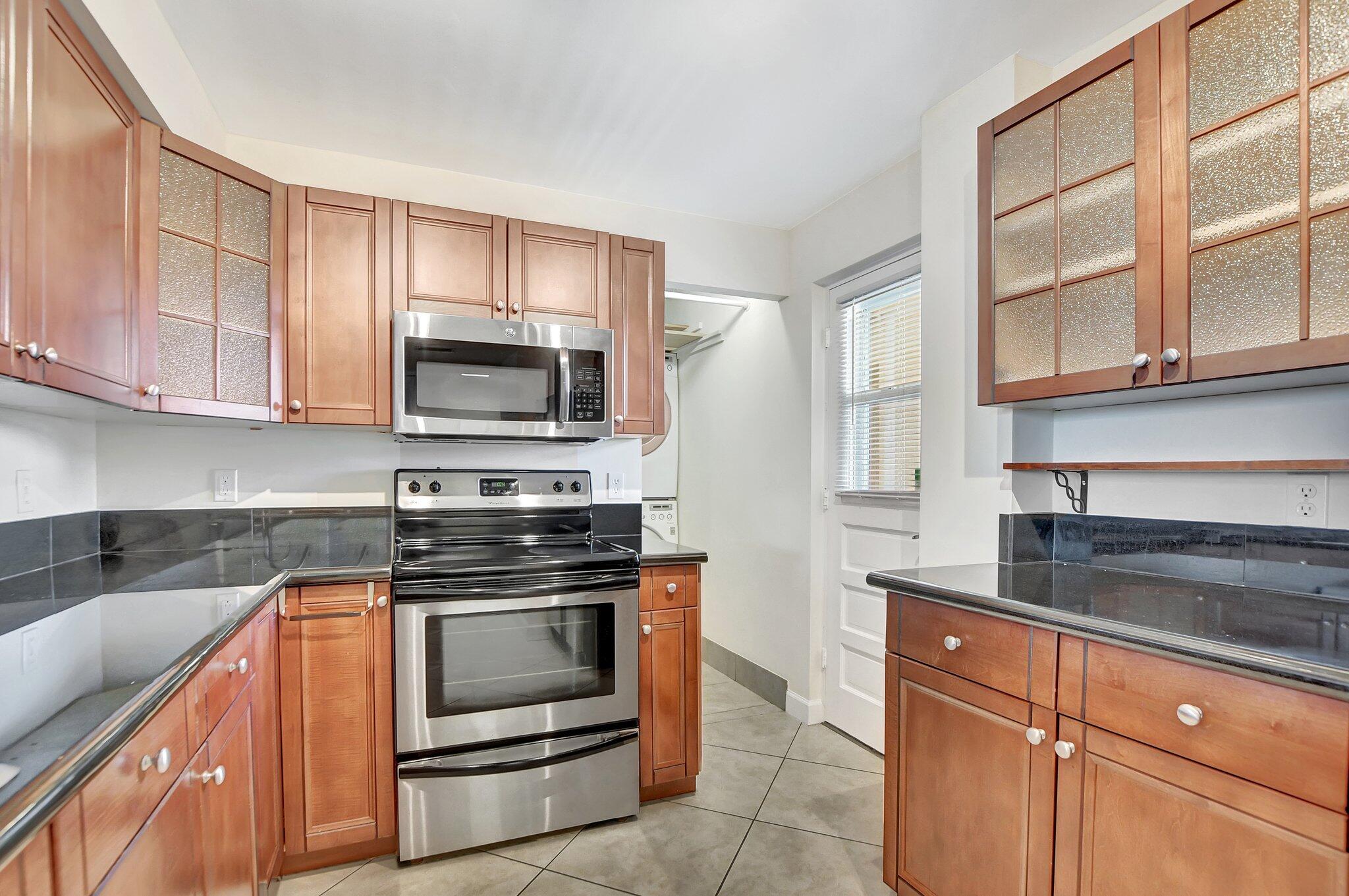6461 Northwest 2nd Avenue, Unit 516 Boca Raton, FL 33487 - Photo 2 of 43 kitchen