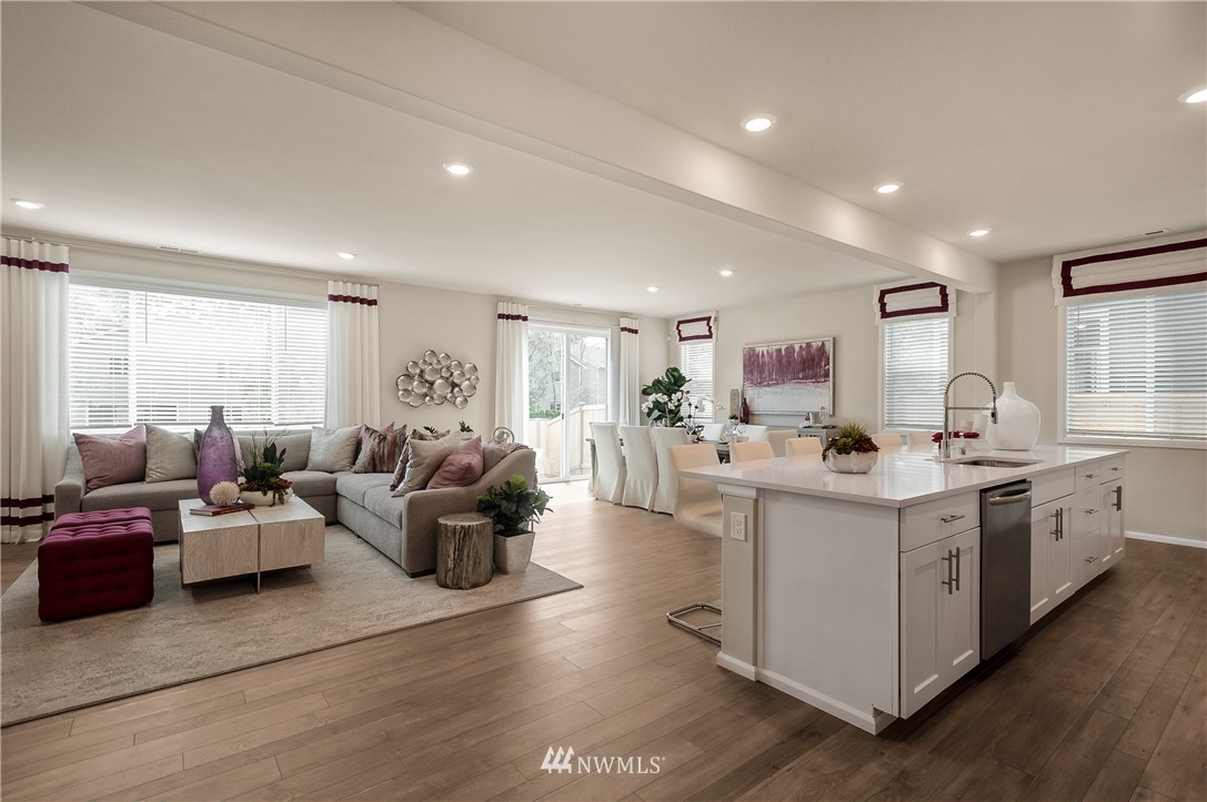 4110 235th Place Southeast, Unit 49 Bothell, WA 98021 - Photo 6 of 18 a living room with furniture and a large window