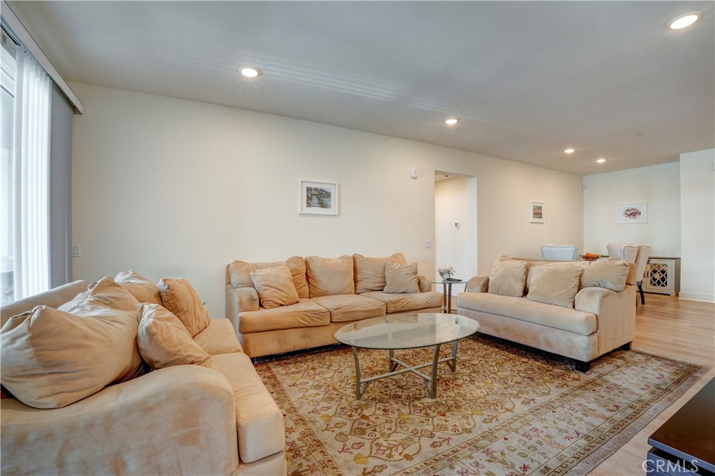 16235 Dawn Way, Unit 203 Tustin, CA 92782 - Photo 27 of 74 a living room with furniture