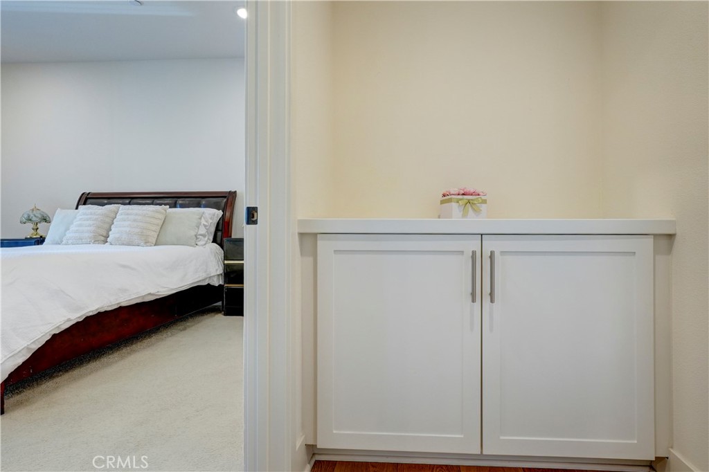 16235 Dawn Way, Unit 203 Tustin, CA 92782 - Photo 38 of 74 a bedroom with a bed and a window