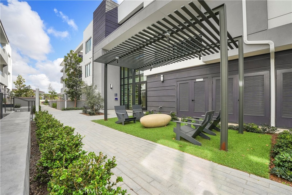 16235 Dawn Way, Unit 203 Tustin, CA 92782 - Photo 60 of 74 a view of an chairs and tables in the patio