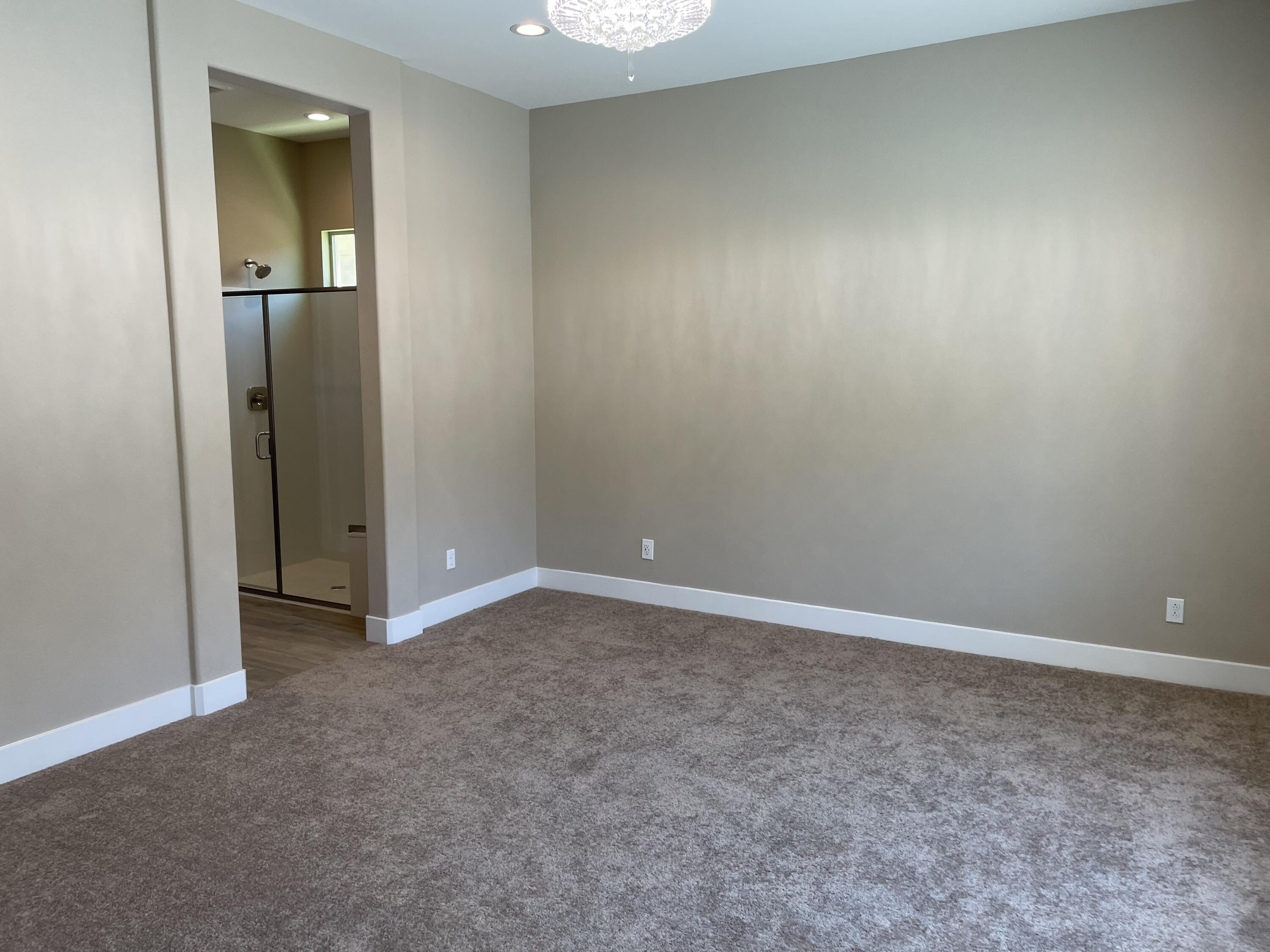 35 Semillon Rancho Mirage, CA 92270 - Photo 13 of 13 an empty room with closet and mirror