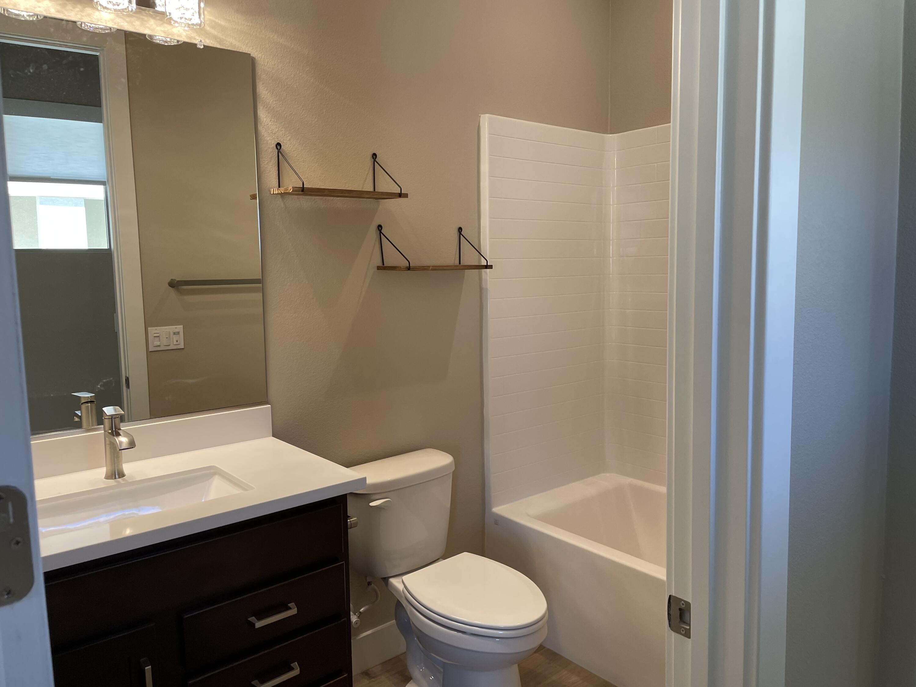 35 Semillon Rancho Mirage, CA 92270 - Photo 5 of 13 a bathroom with a sink a toilet and shower