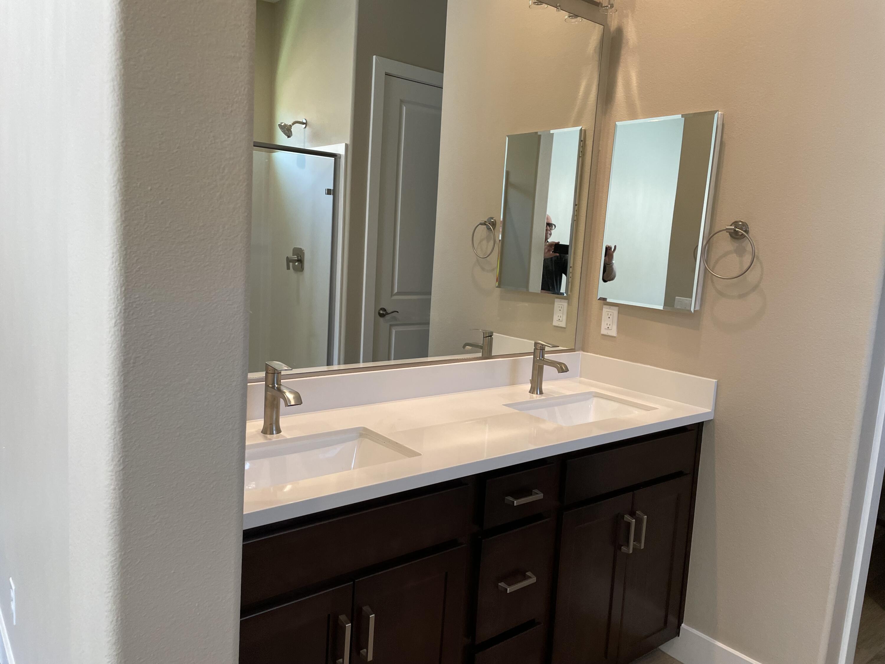 35 Semillon Rancho Mirage, CA 92270 - Photo 7 of 13 a bathroom with a sink and a mirror