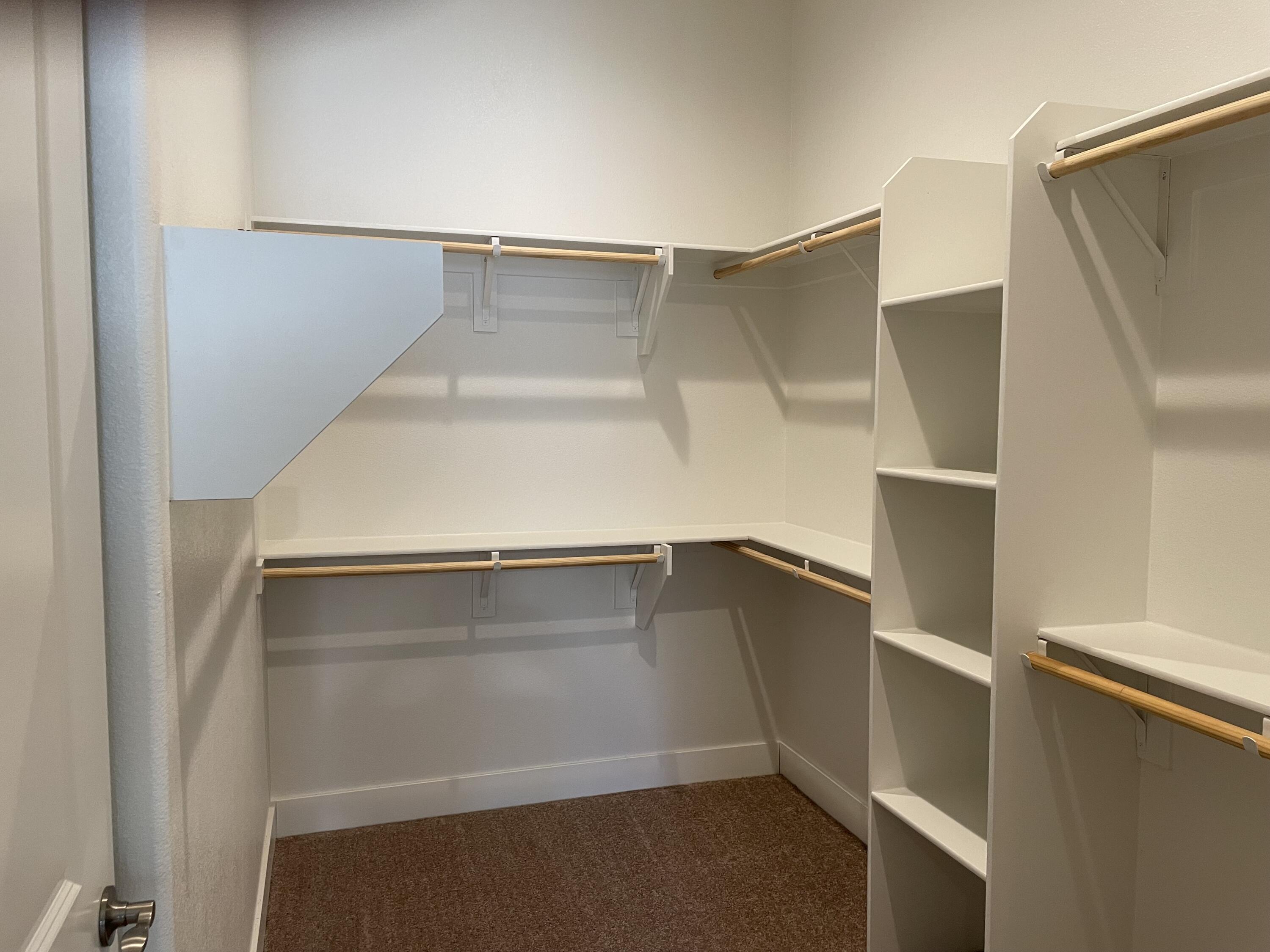 35 Semillon Rancho Mirage, CA 92270 - Photo 9 of 13 a view of an empty walk in closet