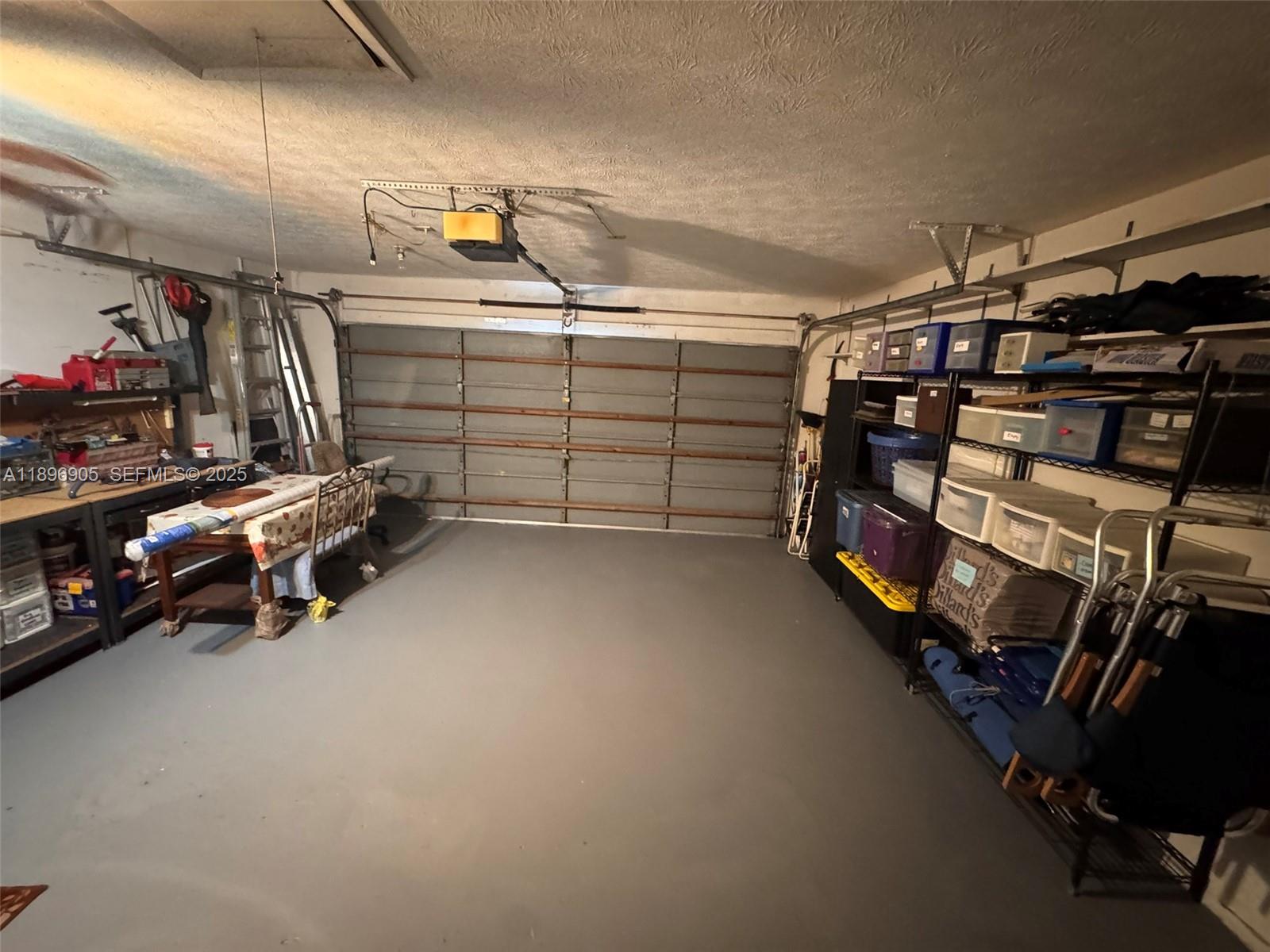 705 Southeast 3rd Lane Dania Beach, FL 33004 - Photo 15 of 15 a view of a storage room with racks