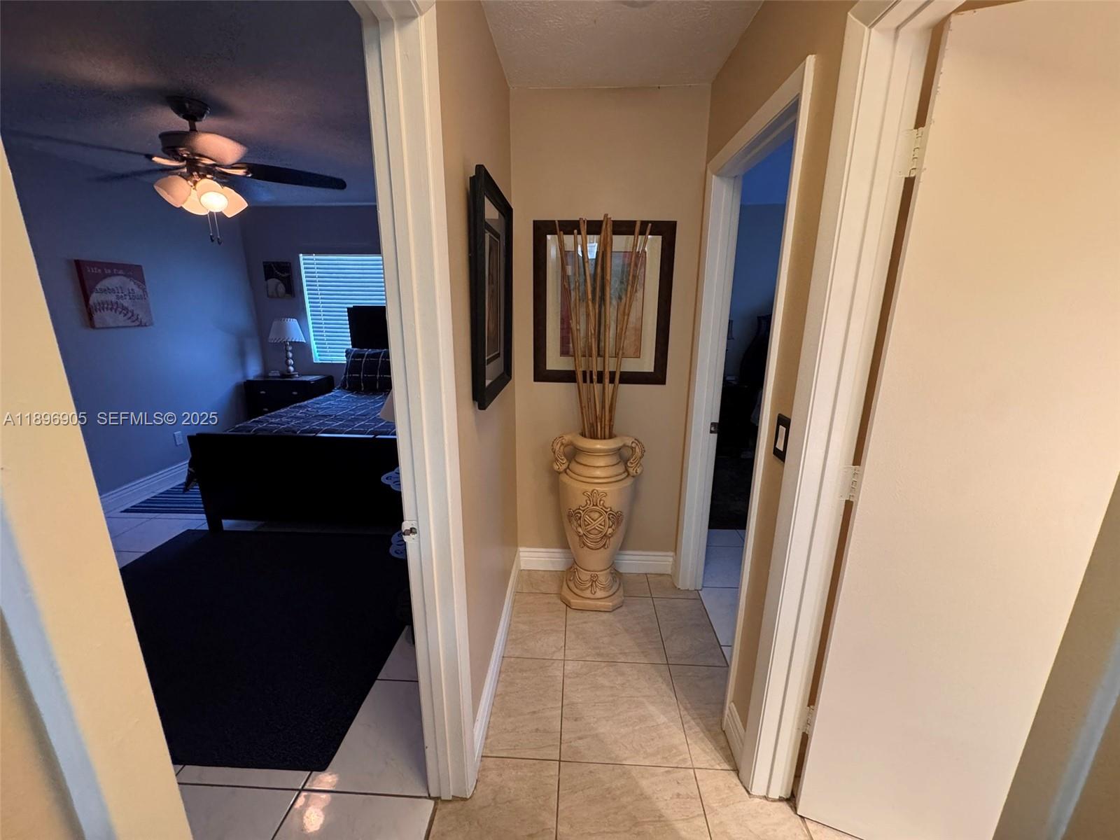 705 Southeast 3rd Lane Dania Beach, FL 33004 - Photo 8 of 15 a view of a hallway and a livingroom with furniture