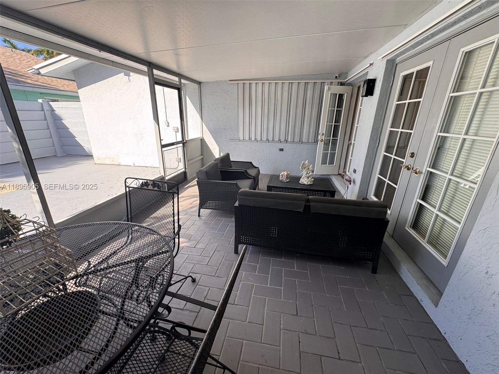 705 Southeast 3rd Lane Dania Beach, FL 33004 - Photo 9 of 15 a living room with a couch