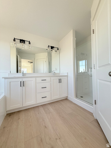 1142 West 220 North Mapleton, UT 84664 - Photo 15 of 26 Full bath with a shower stall, light wood-style floors, and double vanity
