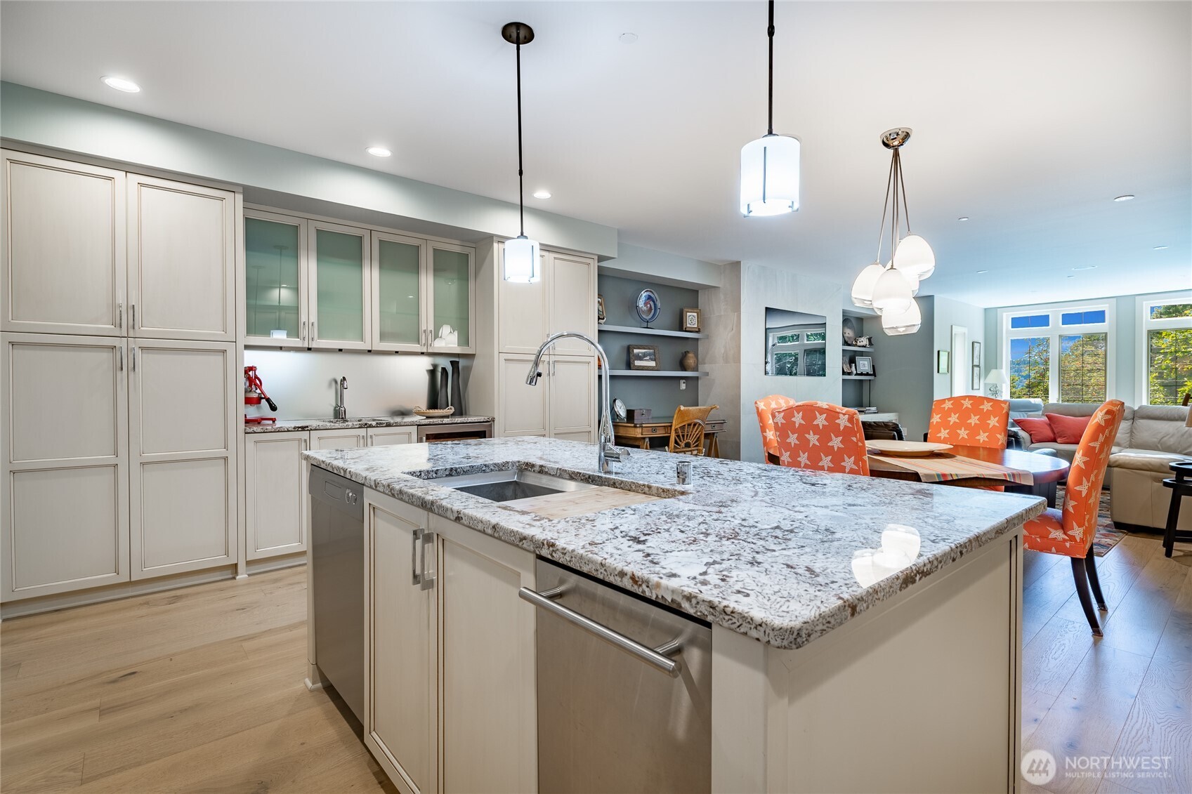 9525 Semiahmoo Parkway, Unit A204 Blaine, WA 98230 - Photo 17 of 37 a kitchen with center island table and chairs
