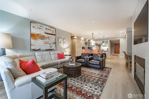 a living room with furniture and a rug