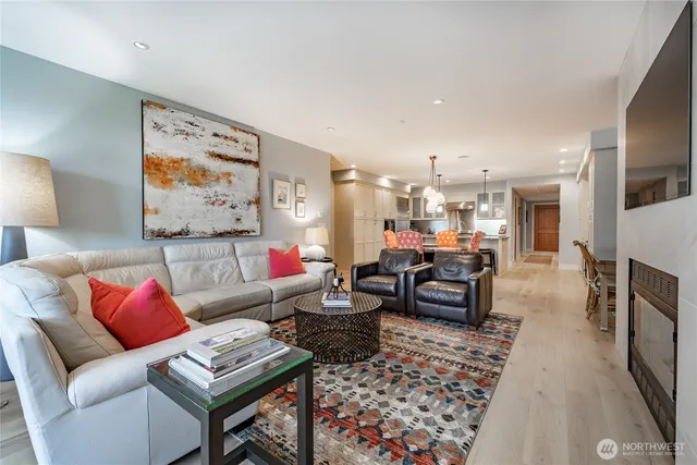 a living room with furniture and a rug