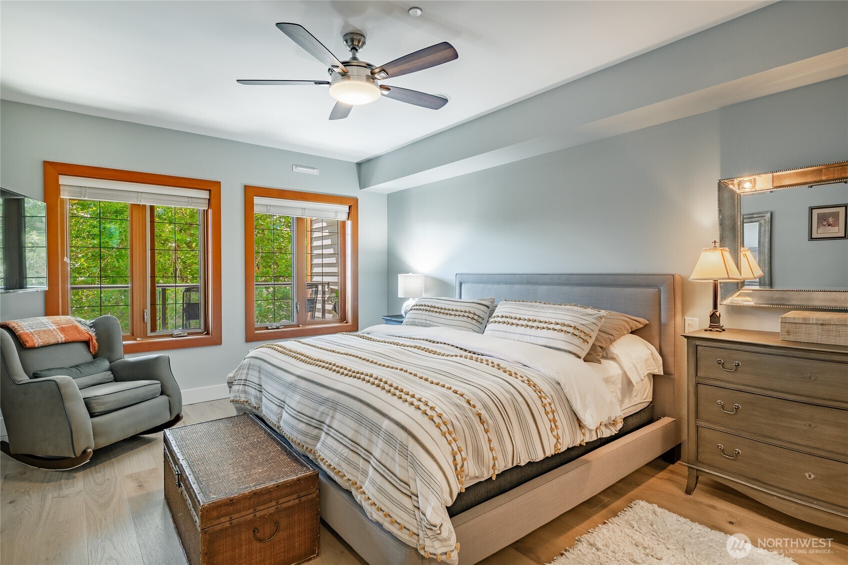 9525 Semiahmoo Parkway, Unit A204 Blaine, WA 98230 - Photo 23 of 37 a bedroom with a bed couch and a large window