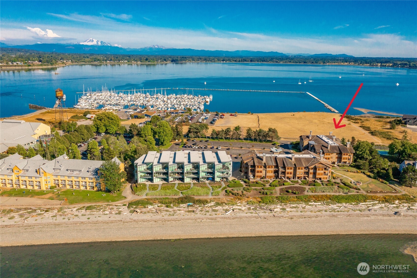 9525 Semiahmoo Parkway, Unit A204 Blaine, WA 98230 - Photo 34 of 37 a view of a lake with a big yard