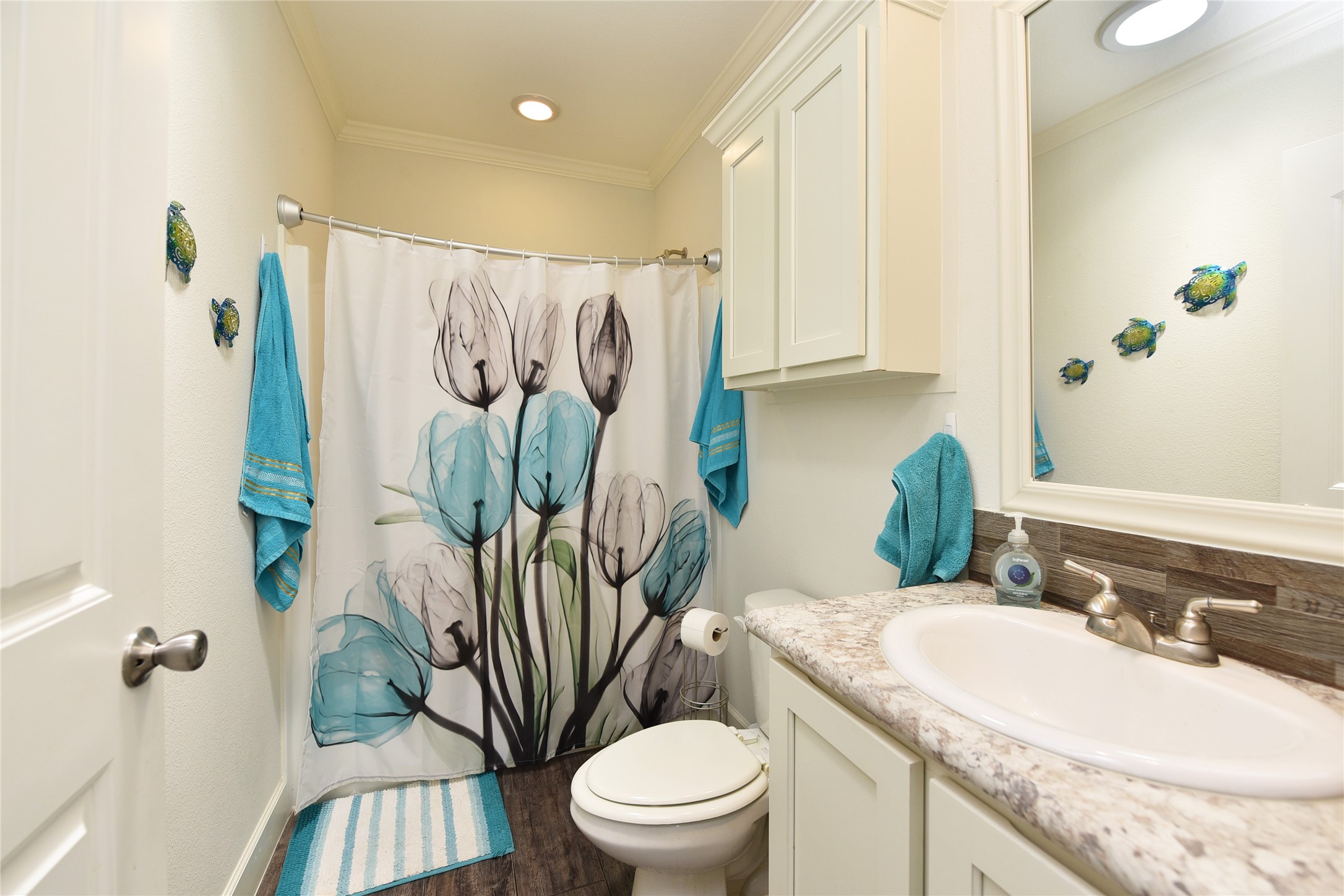 3221 Pecha Lane Rosenberg, TX 77471 - Photo 21 of 46 a bathroom with a granite countertop sink a toilet and a mirror