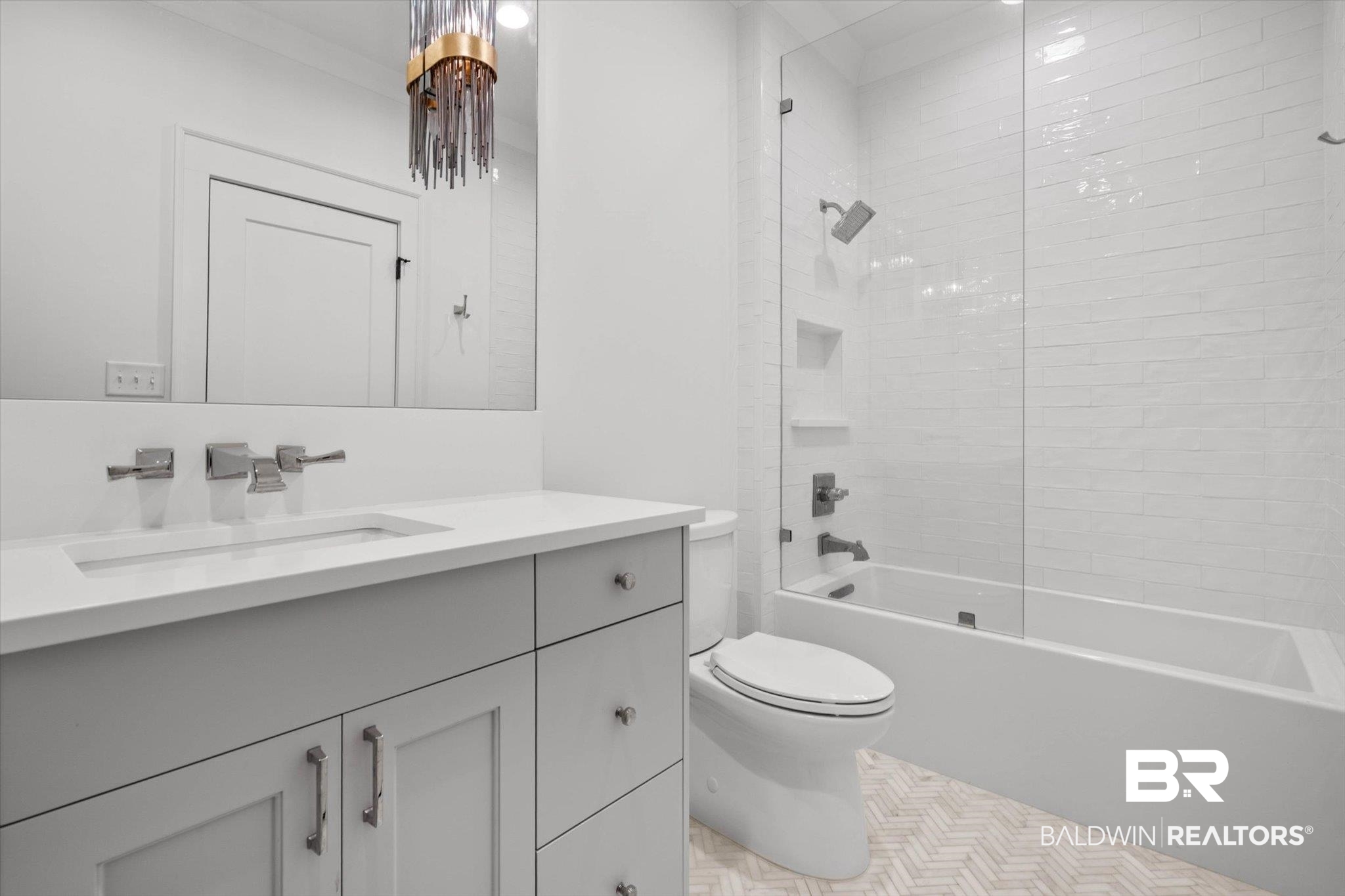 4602 Kingswood Drive Mobile, AL 36608 - Photo 25 of 45 Bathroom featuring vanity, shower combination, and light tile patterned flooring