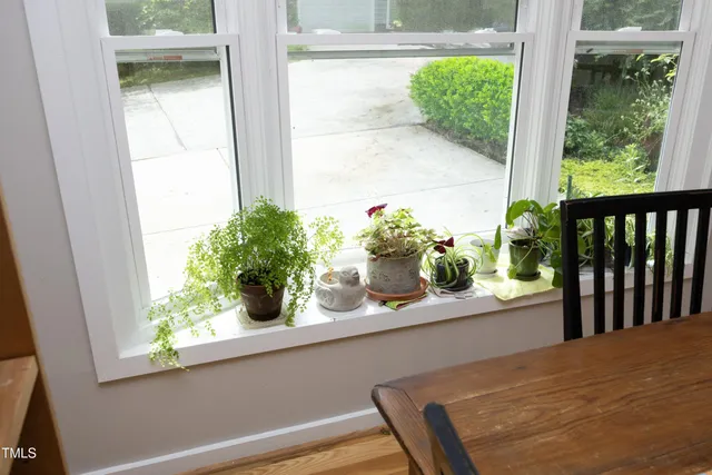 a view of a vase of flowers sitting on a table