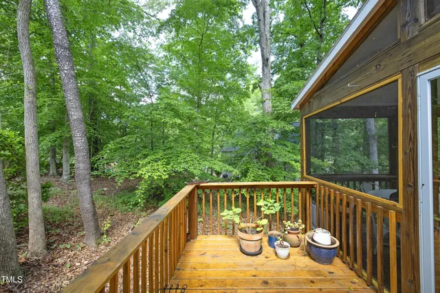 a view of a two chairs in the balcony