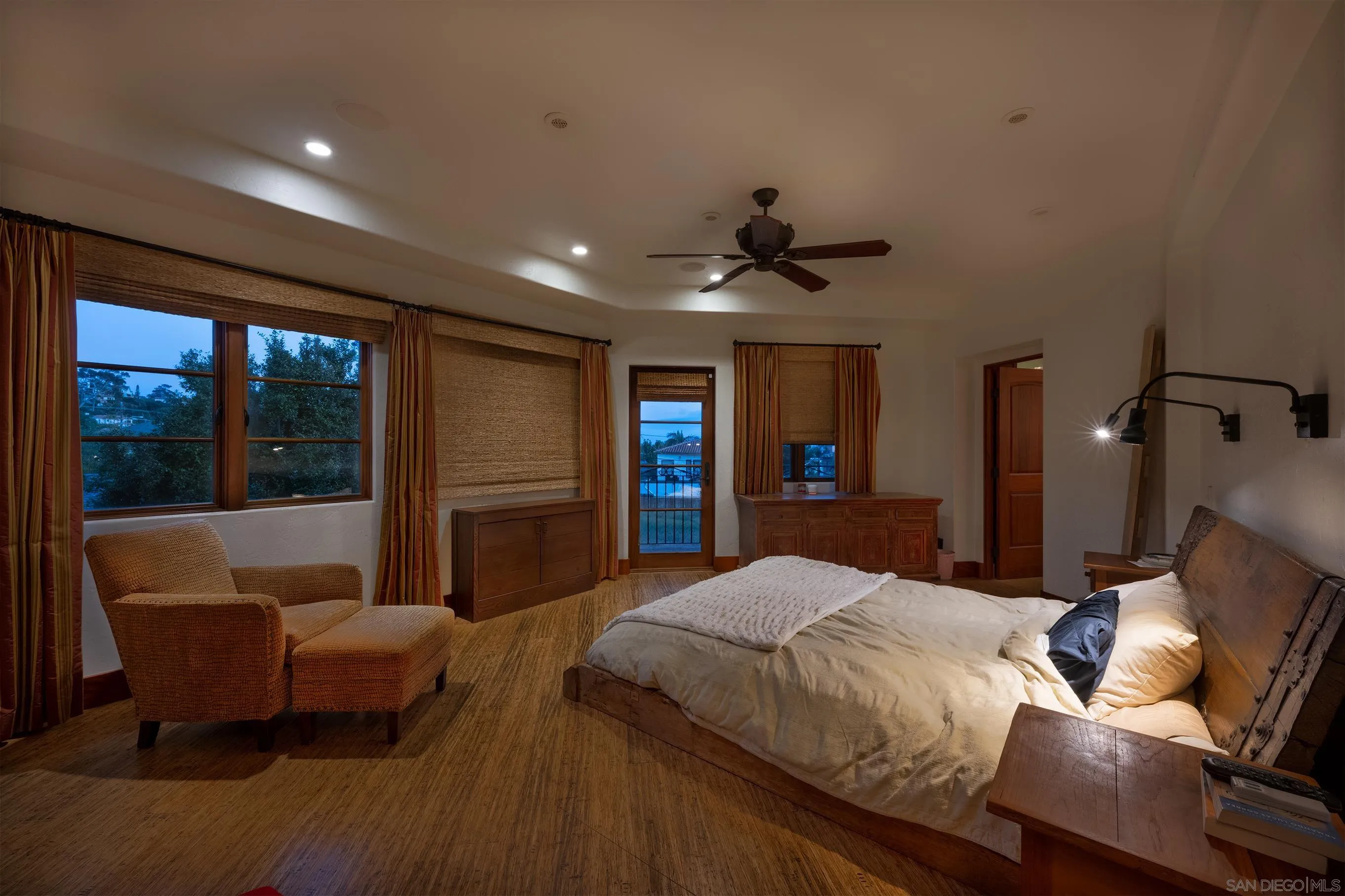 1245 Park Row La Jolla, CA 92037 - Photo 14 of 23 a bedroom with a large bed and a couch