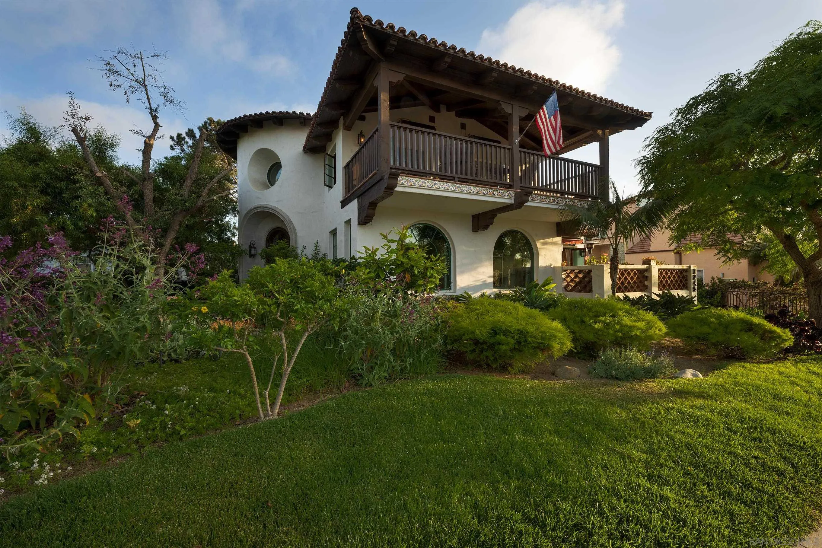1245 Park Row La Jolla, CA 92037 - Photo 2 of 23 a front view of a house with a garden