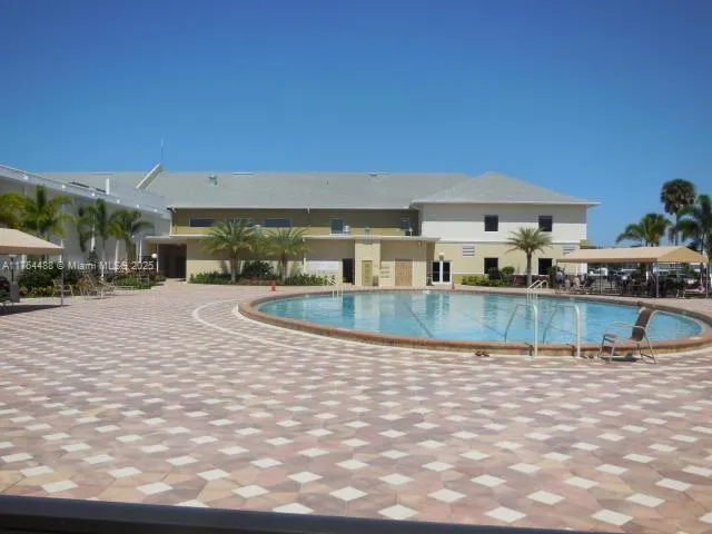 a view of a house with a swimming pool