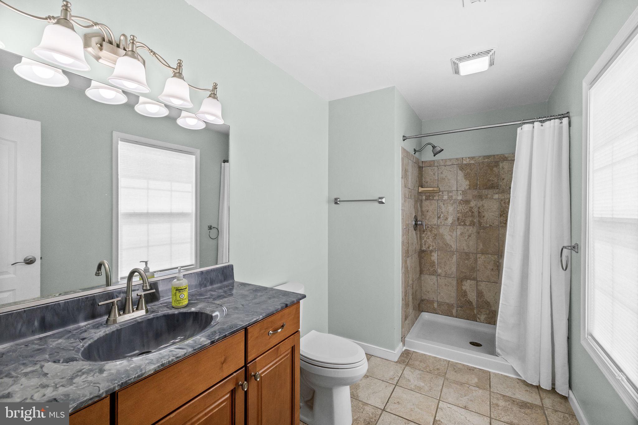 77 Randall Road Colonial Beach, VA 22443 - Photo 33 of 44 Modern bathroom with elegant finishes.