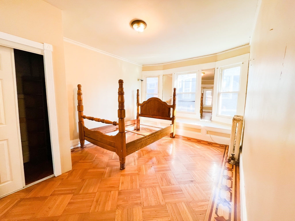 68 Forest Park Avenue Springfield, MA 01108 - Photo 11 of 19 a living room with a large window and outer view