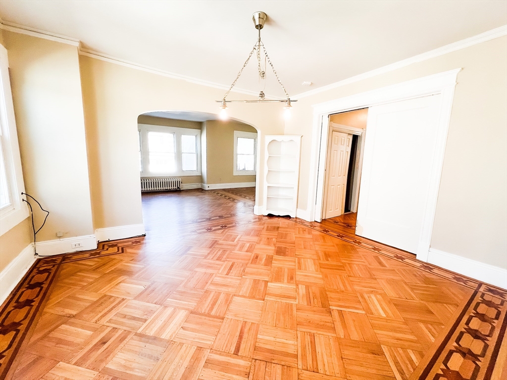 68 Forest Park Avenue Springfield, MA 01108 - Photo 17 of 19 a view of a room with wooden floor and white walls