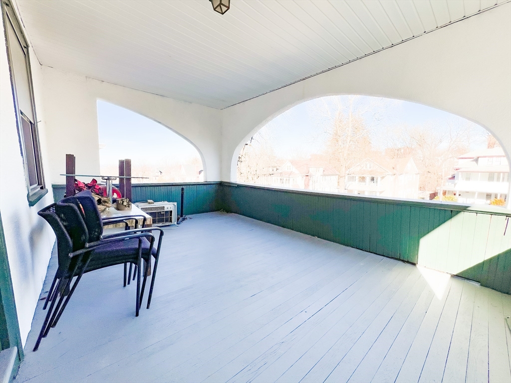 68 Forest Park Avenue Springfield, MA 01108 - Photo 5 of 19 a workspace with furniture hardwood and a window