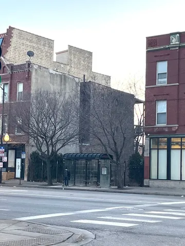 a view of a building with a street