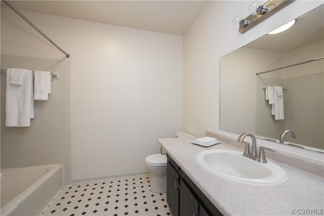 4511 Crossgate Road Chester, VA 23831 - Photo 13 of 21 The hall bathroom features a tub/shower combo.
