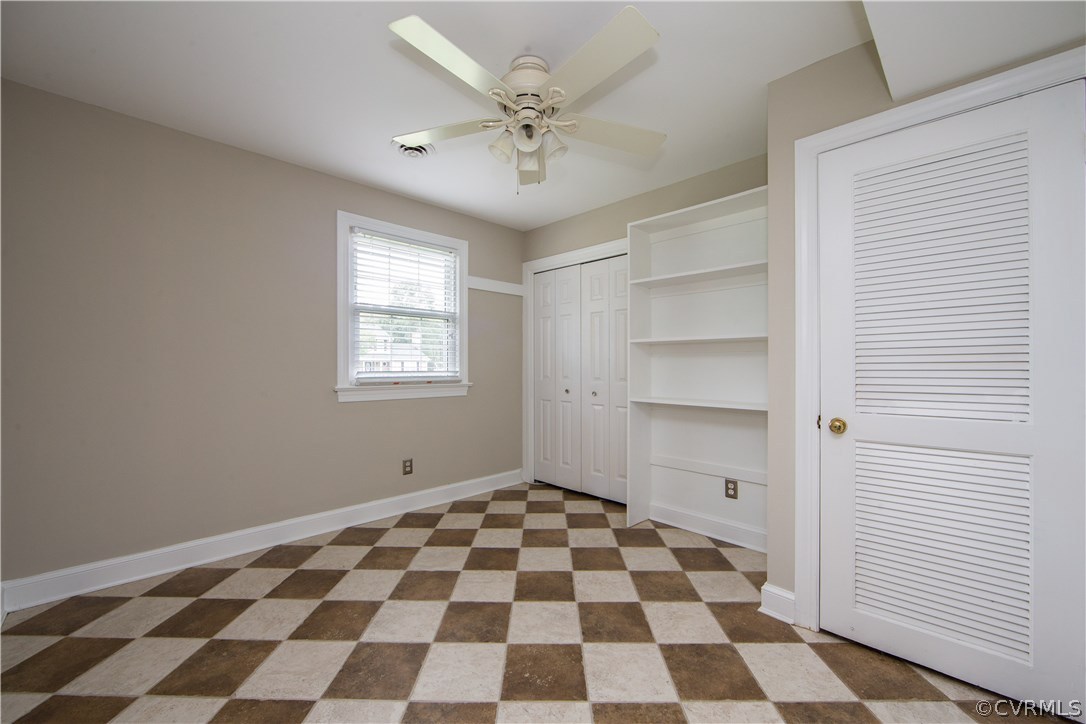 4511 Crossgate Road Chester, VA 23831 - Photo 14 of 21 Bedroom features a built-in bookcase.
