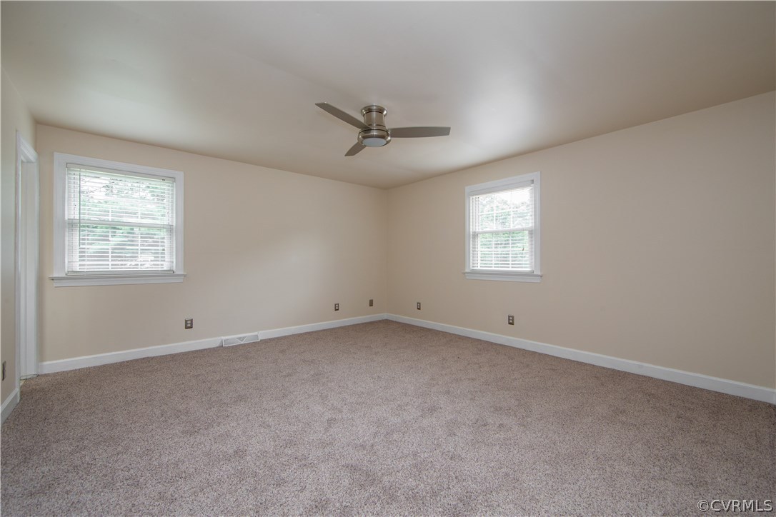 4511 Crossgate Road Chester, VA 23831 - Photo 8 of 21 The master bedroom is large, and the new carpet fe