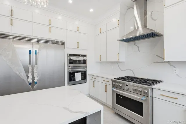 a view of water heater room with a wooden floor