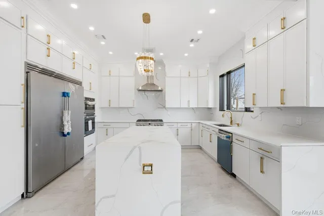 a view of an empty room with a fireplace