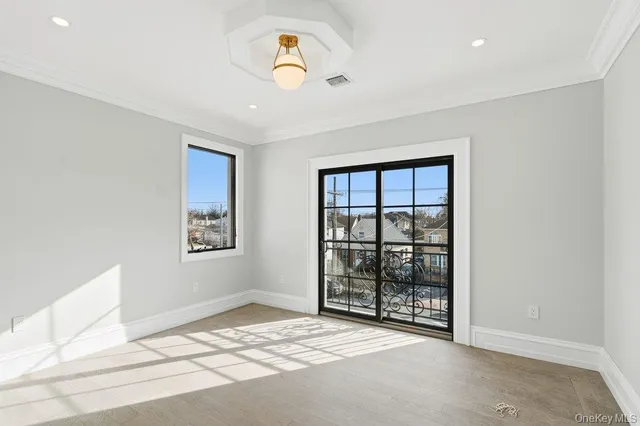 a bathroom with a sink mirror and shower