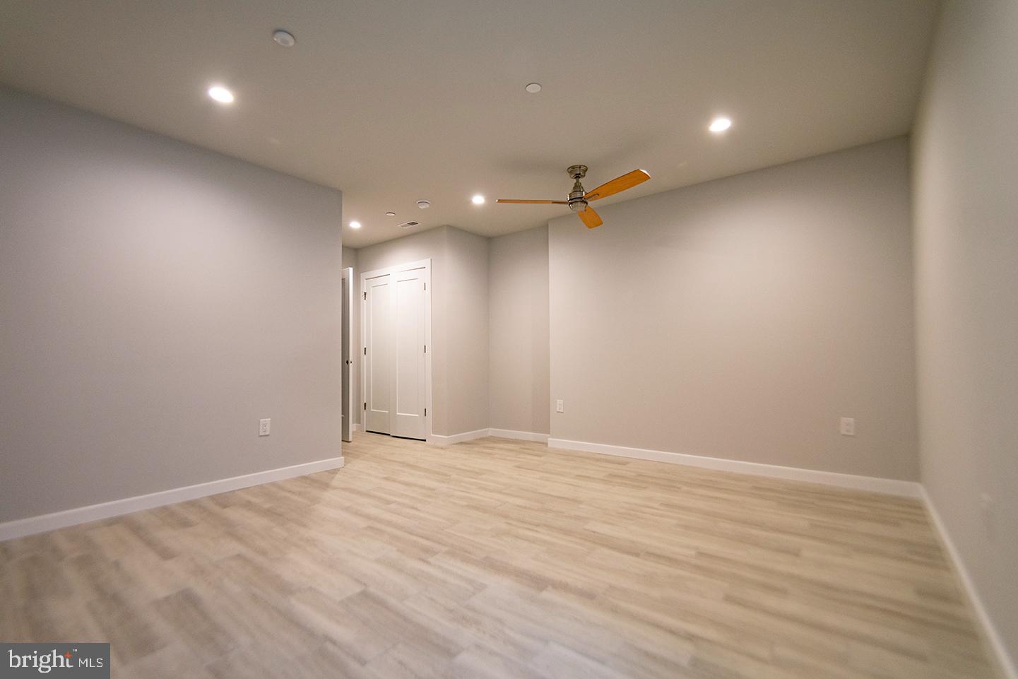 1713 South 20th Street, Unit 1 Philadelphia, PA 19145 - Photo 12 of 15 Spacious, modern room with sleek design.