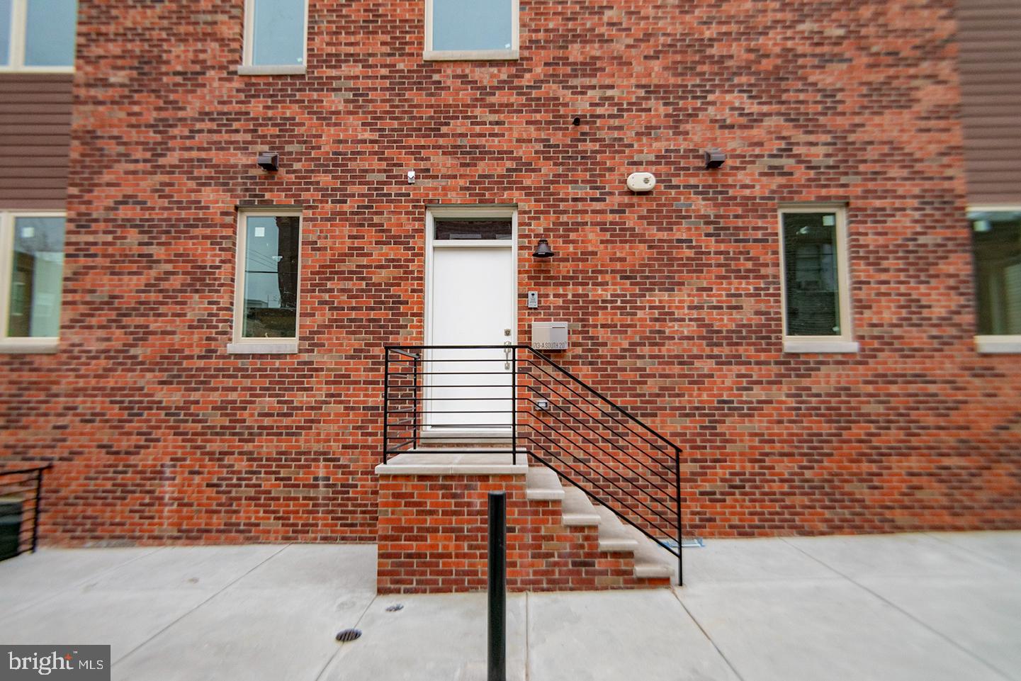 1713 South 20th Street, Unit 1 Philadelphia, PA 19145 - Photo 15 of 15 Modern brick facade with inviting entrance.