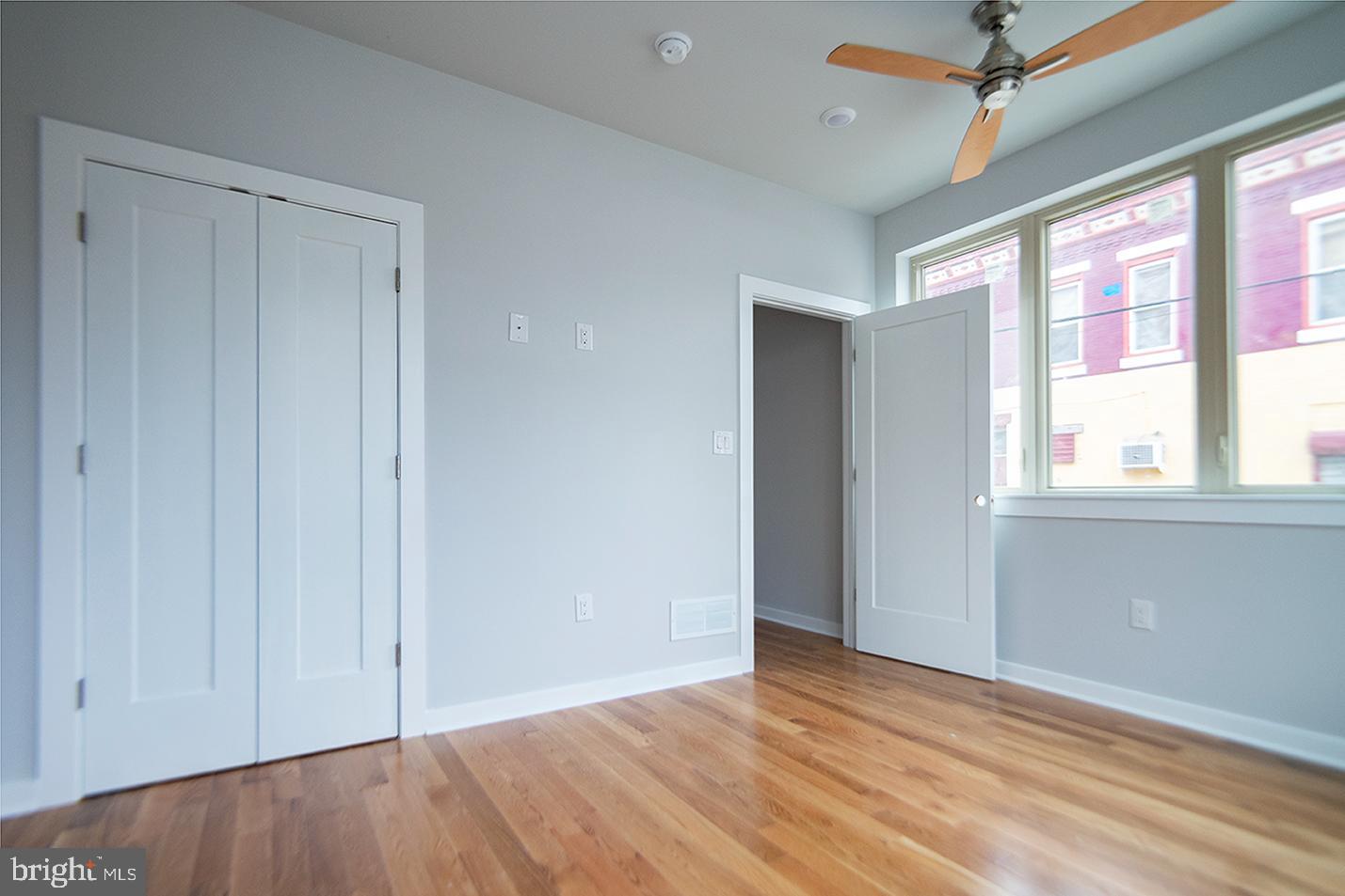 1713 South 20th Street, Unit 1 Philadelphia, PA 19145 - Photo 6 of 15 Bright and airy room with modern finishes.