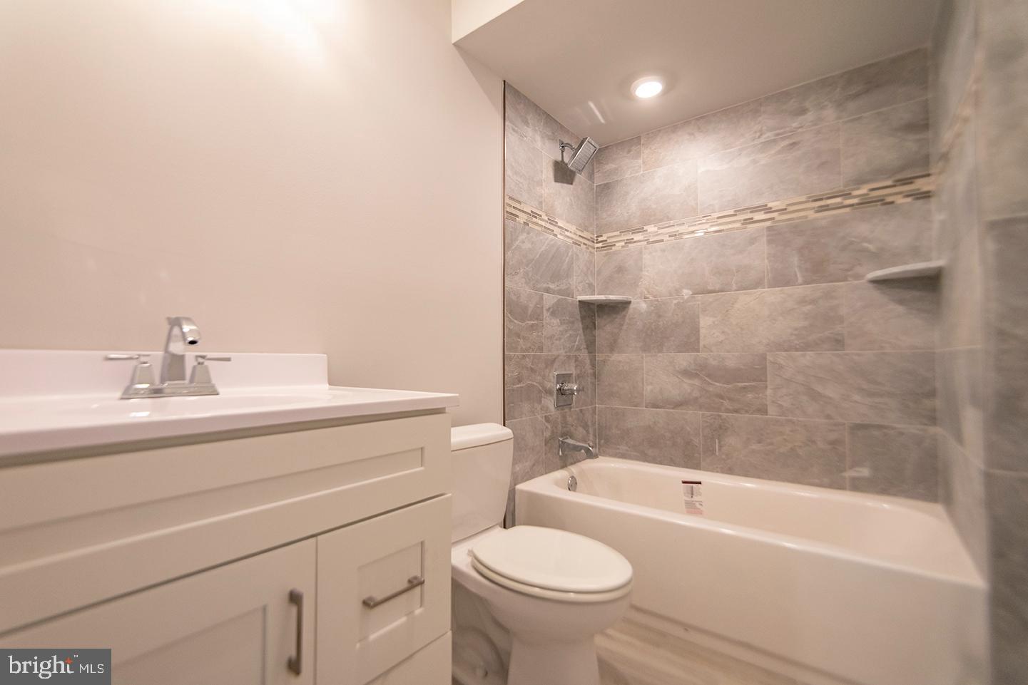 1713 South 20th Street, Unit 1 Philadelphia, PA 19145 - Photo 10 of 15 Modern bathroom with elegant tile accents.