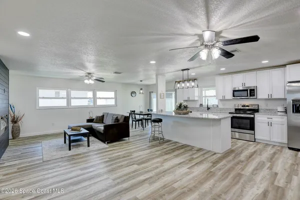 a room with furniture and a fireplace